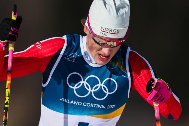 Norway's Johannes Hoesflot Klaebo competes during the men's cross country 10km + 10km skiathlon event of the Milano Cortina 2026 Winter Olympic Games at Tesero Cross-Country Skiing Stadium in Lago di Tesero (Val di Fiemme), on February 8, 2026. (Photo by Anne-Christine POUJOULAT / AFP)