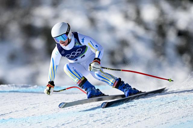 Argentina's Nicole Begue competes in the women's downhill event during the Milano Cortina 2026 Winter Olympic Games at the Tofane Alpine Skiing Centre in Cortina d’Ampezzo on February 8, 2026. (Photo by Franзois-Xavier MARIT / AFP)