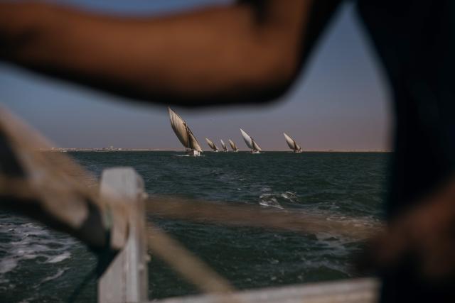 Traditional sailing boats are seen off the coast during The Blue March at the Banc d’Arguin on February 7, 2026. The Blue March held its second edition this year at the Banc d’Arguin, a UNESCO World Heritage site marking its 50th anniversary. The citizen-led artistic and environmental initiative is organised by the Mauritanian Environmental Association (AME), and was initiated by Mauritanian-born Malian film director Abderrahmane Sissako and Senegalese screenwriter Kessen Fatoumata Tall.
The week-long collective walk aims to raise awareness of Mauritania’s biodiversity and foster dialogue on climate change and desertification among researchers, artists and policymakers. (Photo by Kang-Chun Cheng / AFP)