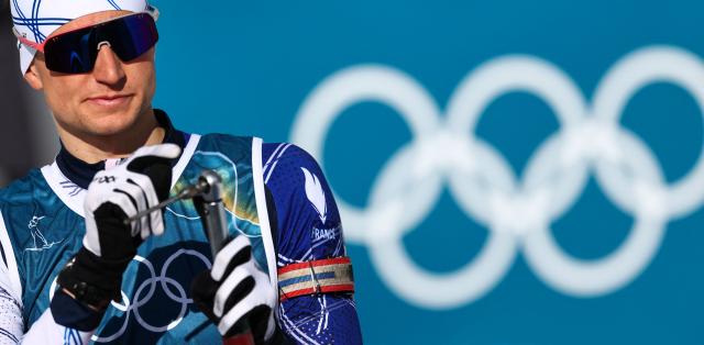 France's Eric Perrot looks on ahead of the mixed biathlon 4 x 6km relay event during the Milano Cortina 2026 Winter Olympic Games at the Anterselva Biathlon Arena (Sudtirol Arena) in Anterselva (Val Pusteria) on February 8, 2026. (Photo by FRANCK FIFE / AFP)