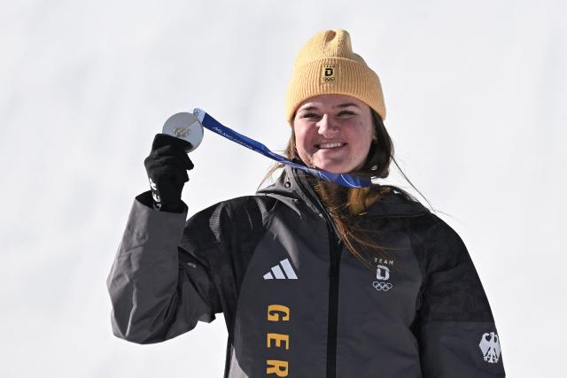 Silver medallist poses after the podium of the women's downhill event during the Milano Cortina 2026 Winter Olympic Games at the Tofane Alpine Skiing Centre in Cortina d’Ampezzo on February 8, 2026. (Photo by Tiziana FABI / AFP)
