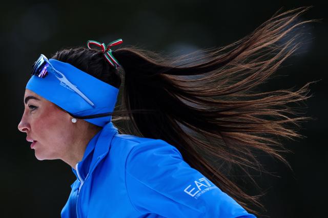 Italy's Dorothea Wierer warms up ahead of the mixed biathlon 4 x 6km relay event during the Milano Cortina 2026 Winter Olympic Games at the Anterselva Biathlon Arena (Sudtirol Arena) in Anterselva (Val Pusteria) on February 8, 2026. (Photo by FRANCK FIFE / AFP)
