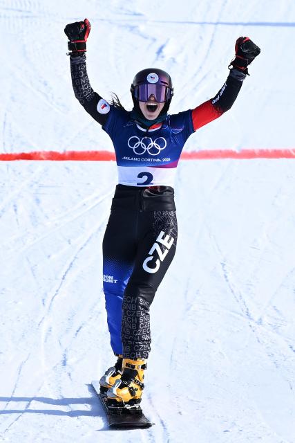 Czech Republic's Zuzana Maderova celebrates winning the snowboard women's parallel giant slalom final at Livigno Snow Park during the Milano Cortina 2026 Winter Olympic Games, in Livigno (Valtellina), on February 8, 2026. (Photo by Kirill KUDRYAVTSEV / AFP)