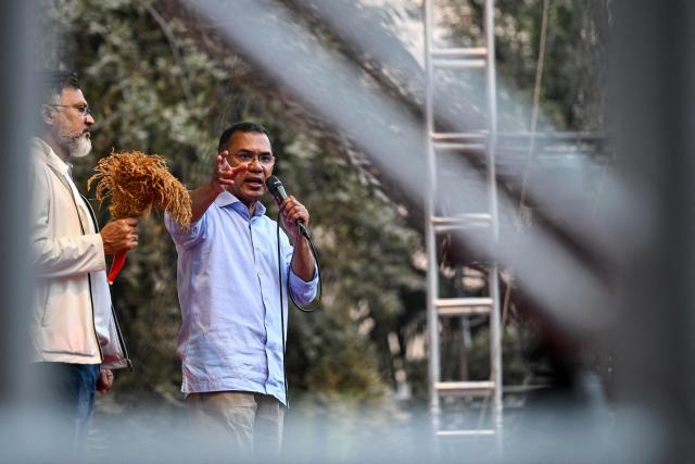 Bangladesh Nationalist Party (BNP) Chairman Tarique Rahman addresses an election rally ahead of the country's general election in Dhaka on February 8, 2026. Bangladesh's elections next week could reshape South Asia's balance of power, as Beijing seeks to consolidate influence and ties with India falter, analysts say. (Photo by Sajjad HUSSAIN / AFP)