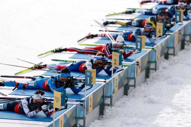 Athletes shoot in the mixed biathlon 4 x 6km relay event during the Milano Cortina 2026 Winter Olympic Games at the Anterselva Biathlon Arena (Sudtirol Arena) in Anterselva (Val Pusteria) on February 8, 2026. (Photo by Odd ANDERSEN / AFP)