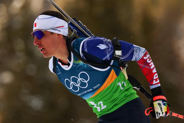 France's Quentin Fillon Maillet skis in the mixed biathlon 4 x 6km relay event during the Milano Cortina 2026 Winter Olympic Games at the Anterselva Biathlon Arena (Sudtirol Arena) in Anterselva (Val Pusteria) on February 8, 2026. (Photo by FRANCK FIFE / AFP)