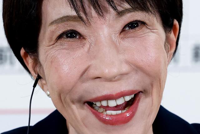 Japan's Prime Minister and President of the Liberal Democratic Party (LDP) Sanae Takaichi reacts as she speaks with media on the House of Representatives election day at the LDP headquarters in Tokyo on February 8, 2026. (Photo by Kim Kyung-Hoon / POOL / AFP)