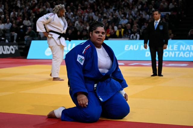 France's Lea Fontaine reacts as she competes against France's Romane Dicko in their women's +78kg semi-final at the Paris Grand Slam judo tournament in Paris on February 8, 2026. (Photo by Julie SEBADELHA / AFP)