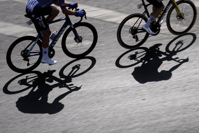 The pack rides during the 2nd stage of the Tour of Oman cycling race from Al Rustaq Fort to Yitti Hills on February 8, 2026. (Photo by Loic VENANCE / AFP)