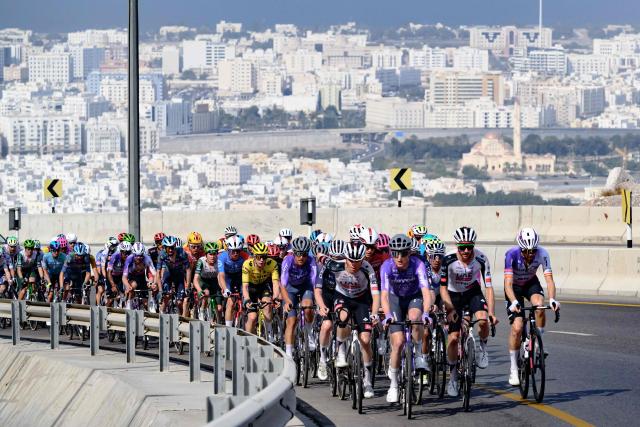 The pack rides during the 2nd stage of the Tour of Oman cycling race from Al Rustaq Fort to Yitti Hills on February 8, 2026. (Photo by Loic VENANCE / AFP)