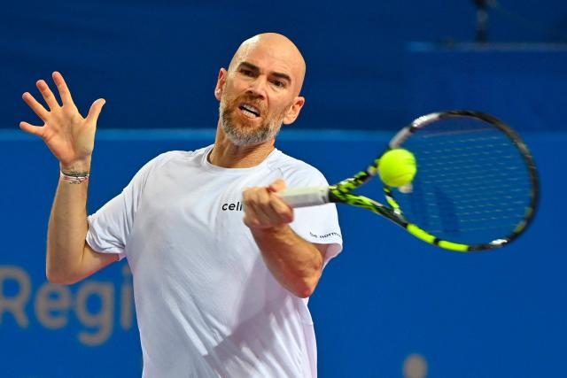 France's Adrian Mannarino returns the ball to Canada's Felix Auger Aliassime during their ATP World Tour Open Occitanie Men's final tennis match in Montpellier, southern France on February 8, 2026. (Photo by Sylvain THOMAS / AFP)