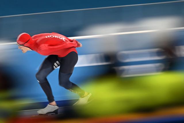 Norway's Sigurd Henriksen competes in the speed skating men's 5000m during the Milano Cortina 2026 Winter Olympic Games at Milano Speed Skating Stadium in Milan on February 8, 2026. (Photo by Gabriel BOUYS / AFP)