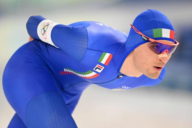 Italy's Riccardo Lorello competes in the speed skating men's 5000m during the Milano Cortina 2026 Winter Olympic Games at Milano Speed Skating Stadium in Milan on February 8, 2026. (Photo by Daniel MUNOZ / AFP)