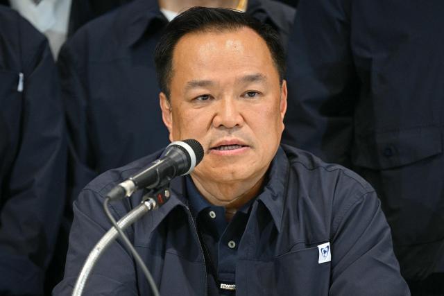 Thailand's Prime Minister and Bhumjaithai Party leader Anutin Charnvirakul speaks during a press conference while awaiting final results in Thailand's general election in Bangkok on February 8, 2026. Anutin was heading for a victory in the country's general election on February 8, television stations projected, with his party set to be by far the largest in parliament after riding a wave of nationalism. (Photo by ANTHONY WALLACE / AFP)
