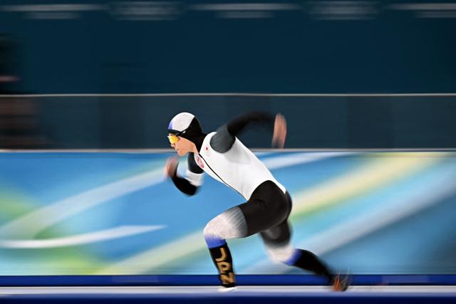 Japan's Shomu Sasaki competes in the speed skating men's 5000m during the Milano Cortina 2026 Winter Olympic Games at Milano Speed Skating Stadium in Milan on February 8, 2026. (Photo by Gabriel BOUYS / AFP)