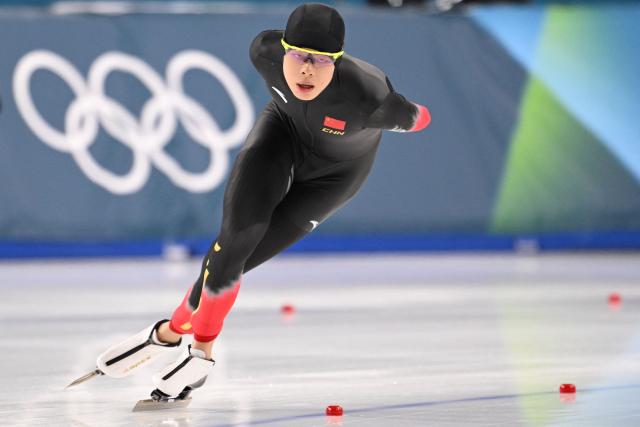 China's Liu Hanbin competes in the speed skating men's 5000m during the Milano Cortina 2026 Winter Olympic Games at Milano Speed Skating Stadium in Milan on February 8, 2026. (Photo by Daniel MUNOZ / AFP)