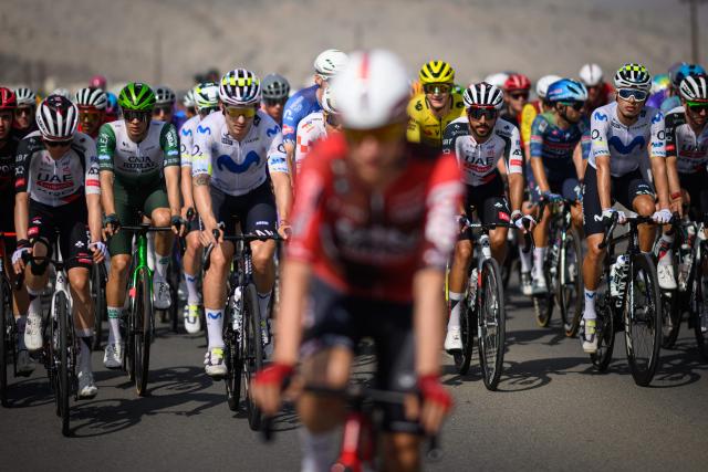 The pack rides during the 2nd stage of the Tour of Oman cycling race from Al Rustaq Fort to Yitti Hills, on February 8, 2026. (Photo by Loic VENANCE / AFP)
