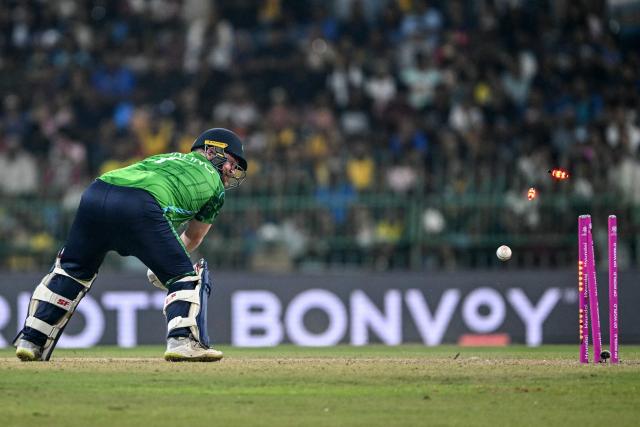 Ireland's captain Paul Stirling is clean bowled by Sri Lanka's Maheesh Theekshana during the 2026 ICC Men's T20 Cricket World Cup group stage match between Sri Lanka and Ireland at the R Premadasa Stadium in Colombo on February 8, 2026. (Photo by Ishara S. KODIKARA / AFP)