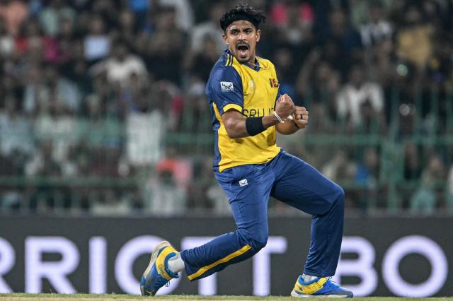 Sri Lanka's Maheesh Theekshana celebrates after taking the wicket of Ireland's captain Paul Stirling during the 2026 ICC Men's T20 Cricket World Cup group stage match between Sri Lanka and Ireland at the R Premadasa Stadium in Colombo on February 8, 2026. (Photo by Ishara S. KODIKARA / AFP)