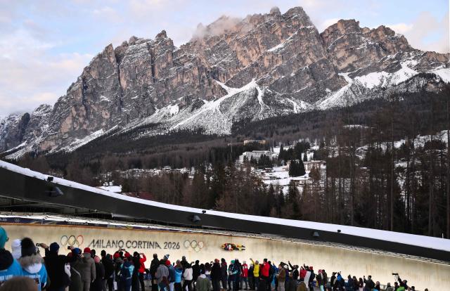 Germany's Max Langenhan competes in the luge men's singles run 3 at Cortina Sliding Centre during the Milano Cortina 2026 Winter Olympic Games in Cortina d'Ampezzo on February 8, 2026. (Photo by Marco BERTORELLO / AFP)
