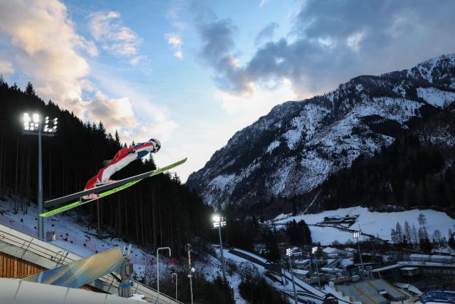 Czech Republic's Veronika Jencova jumps during the women's ski jumping normal hill training of the Milano Cortina 2026 Winter Olympic Games at Predazzo Ski Jumping Stadium in Predazzo (Val di Fiemme) on February 8, 2026. (Photo by Anne-Christine POUJOULAT / AFP)