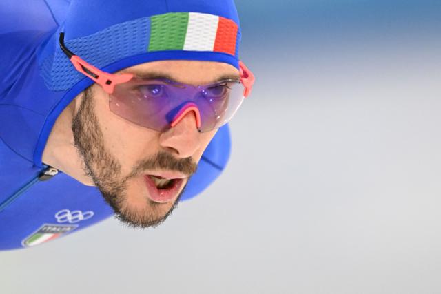 Italy's Davide Ghiotto competes in the speed skating men's 5000m during the Milano Cortina 2026 Winter Olympic Games at Milano Speed Skating Stadium in Milan on February 8, 2026. (Photo by Daniel MUNOZ / AFP)
