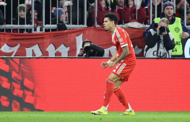 Bayern Munich's Colombian forward #14 Luis Diaz celebrates scoring during the German first division Bundesliga football match between FC Bayern Munich and TSG 1899 Hoffenheim in Munich, southern Germany on February 8, 2026. (Photo by Alexandra BEIER / AFP) / DFL REGULATIONS PROHIBIT ANY USE OF PHOTOGRAPHS AS IMAGE SEQUENCES AND/OR QUASI-VIDEO