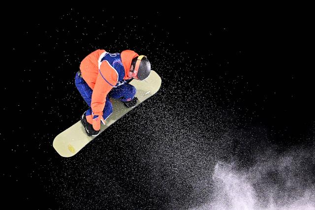 Netherlands' Melissa Peperkamp competes in the snowboard women's big air qualification run 1 at Livigno Snow Park during the Milano Cortina 2026 Winter Olympic Games, in Livigno (Valtellina), on February 8, 2026. (Photo by Kirill KUDRYAVTSEV / AFP)