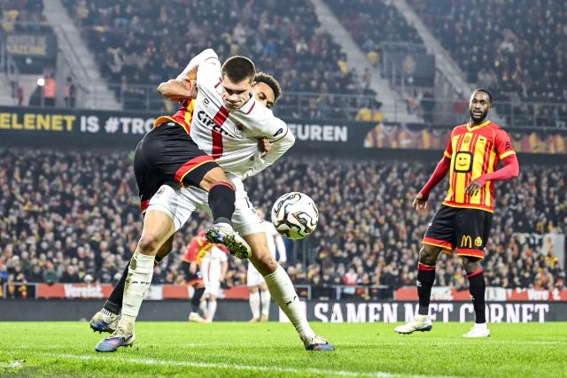 Mechelen's Tommy St. Jago fights for the ball with Antwerp's Gerard Vandeplas during the Belgian "Pro League" First Division football match between KV Mechelen and Royal Antwerp FC at Achter De Kazerne in Mechelen on February 8, 2026. (Photo by Tom Goyvaerts / BELGA / AFP) / Belgium OUT