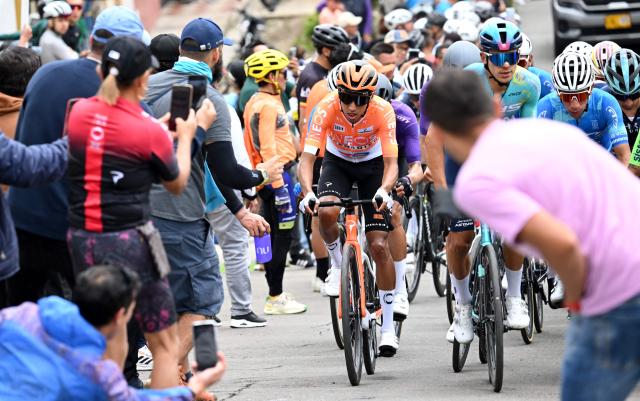 Colombian cyclist Egan Bernal (C) takes part in the National Road Cycling Championships in Zipaquira, Colombia on February 8, 2026. (Photo by Raul ARBOLEDA / AFP)