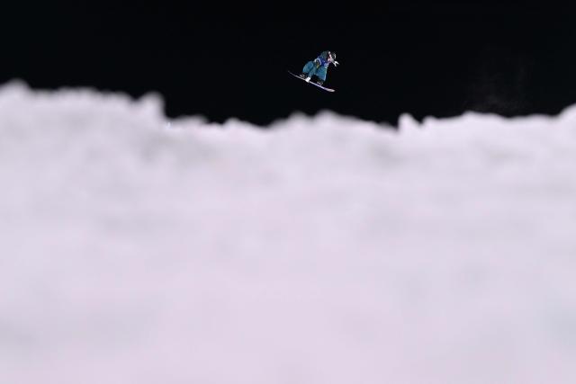 Australia's Tess Coady competes in the snowboard women's big air qualification run 3 at Livigno Snow Park during the Milano Cortina 2026 Winter Olympic Games, in Livigno (Valtellina), on February 8, 2026. (Photo by Kirill KUDRYAVTSEV / AFP)