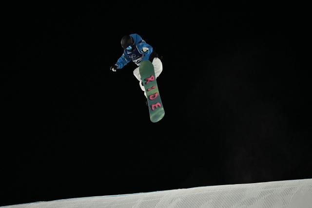 Italy's Marilu Poluzzi competes in the snowboard women's big air qualification run 3 at Livigno Snow Park during the Milano Cortina 2026 Winter Olympic Games, in Livigno (Valtellina), on February 8, 2026. (Photo by Jeff PACHOUD / AFP)