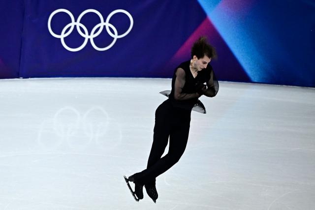 Georgia's Nika Egadze competes in the figure skating men's singles free skating team event during the Milano Cortina 2026 Winter Olympic Games at Milano Ice Skating Arena in Milan on February 8, 2026. (Photo by JULIEN DE ROSA / AFP)