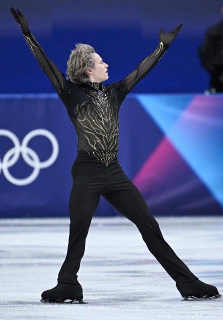USA's Ilia Malinin compete in the figure skating men's singles free skating team event during the Milano Cortina 2026 Winter Olympic Games at Milano Ice Skating Arena in Milan on February 8, 2026. (Photo by WANG Zhao / AFP)