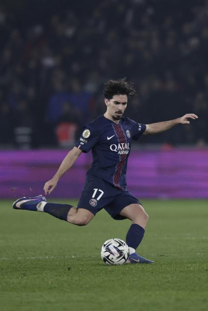 Paris Saint-Germain's Portuguese midfielder #17 Vitinha kicks the ball during the French L1 football match between Paris Saint-Germain (PSG) and Olympique de Marseille (OM) at the Parc des Princes stadium in Paris on February 8, 2026. (Photo by STEPHANE DE SAKUTIN / AFP)