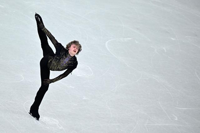 USA's Ilia Malinin compete in the figure skating men's singles free skating team event during the Milano Cortina 2026 Winter Olympic Games at Milano Ice Skating Arena in Milan on February 8, 2026. (Photo by JULIEN DE ROSA / AFP)