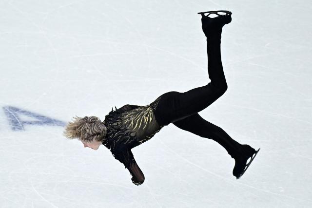 USA's Ilia Malinin compete in the figure skating men's singles free skating team event during the Milano Cortina 2026 Winter Olympic Games at Milano Ice Skating Arena in Milan on February 8, 2026. (Photo by JULIEN DE ROSA / AFP)