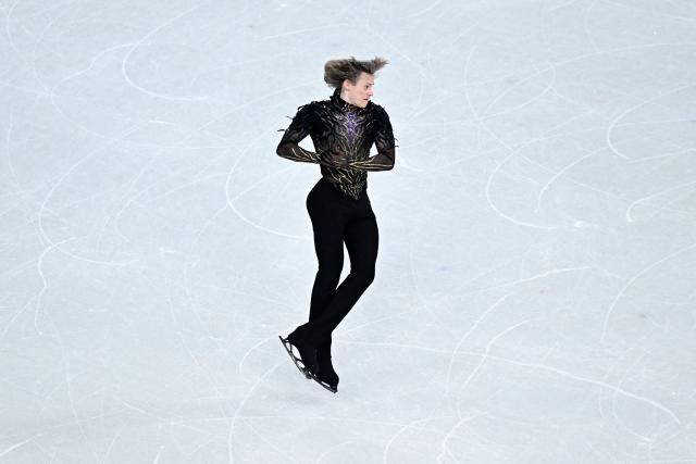 USA's Ilia Malinin compete in the figure skating men's singles free skating team event during the Milano Cortina 2026 Winter Olympic Games at Milano Ice Skating Arena in Milan on February 8, 2026. (Photo by JULIEN DE ROSA / AFP)