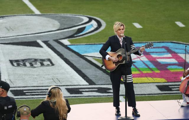 US singer songwriter Brandi Carlile performs "America the Beautiful" ahead of Super Bowl LX between the New England Patriots and Seattle Seahawks at Levi’s Stadium in Santa Clara, California on February 8, 2026. (Photo by Patrick T. Fallon / AFP)