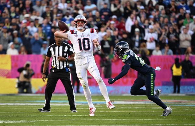 Seattle Seahawks’ cornerback #21 Devon Witherspoon rushes New England Patriots’ quarterback #10 Drake Maye during Super Bowl LX between the New England Patriots and the Seattle Seahawks at Levi's Stadium in Santa Clara, California on February 8, 2026. (Photo by JOSH EDELSON / AFP)