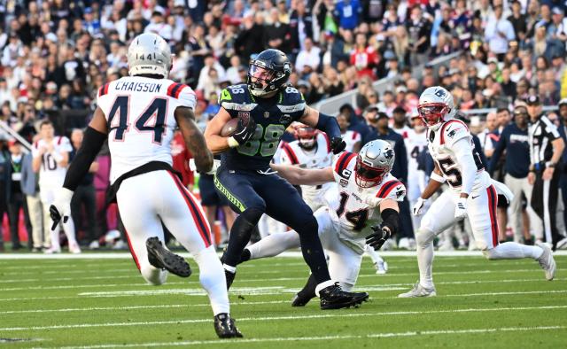 Seattle Seahawks’ tight end #88 AJ Barner holds on to the football during Super Bowl LX between the New England Patriots and the Seattle Seahawks at Levi's Stadium in Santa Clara, California on February 8, 2026. (Photo by JOSH EDELSON / AFP)