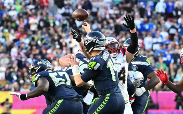 Seattle Seahawks’ quarterback #14 Sam Darnold throws the football during Super Bowl LX between the New England Patriots and the Seattle Seahawks at Levi's Stadium in Santa Clara, California on February 8, 2026. (Photo by JOSH EDELSON / AFP)