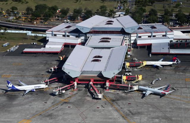 (FILES) Aerial view of Jose Marti International Airport in Havana, taken from an airplane on April 3, 2025. Cuban authorities have informed airlines operating in the country that kerosene supplies will be suspended for a month starting Monday at midnight due to the energy crisis, an executive from a European company told AFP on February 8, 2026. (Photo by YAMIL LAGE / AFP)