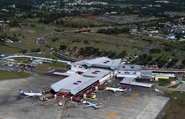 (FILES) Aerial view of Jose Marti International Airport in Havana, taken from an airplane on April 3, 2025. Cuban authorities have informed airlines operating in the country that kerosene supplies will be suspended for a month starting Monday at midnight due to the energy crisis, an executive from a European company told AFP on February 8, 2026. (Photo by YAMIL LAGE / AFP)