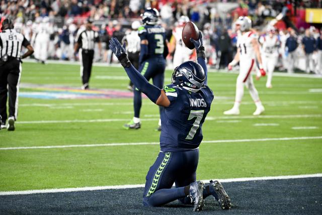 Seattle Seahawks’ linebacker #07 Uchenna Nwosu celebrates scoring a touchdown during Super Bowl LX between the New England Patriots and the Seattle Seahawks at Levi's Stadium in Santa Clara, California on February 8, 2026. (Photo by JOSH EDELSON / AFP)