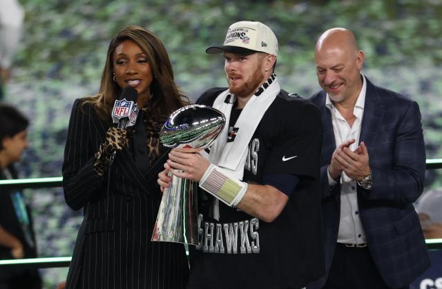 Seattle Seahawks’ quarterback #14 Sam Darnold holds the Vince Lombardi Trophy after the Seattle Seahawks defeated the New England Patriots during Super Bowl LX at Levi's Stadium in Santa Clara, California on February 8, 2026. (Photo by Patrick T. Fallon / AFP)
