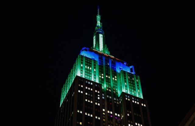 The Empire State Building is lit with the colors of The Seattle Seahawks after they won Super Bowl LX, in New York, on February 8, 2026. (Photo by kena betancur / AFP)