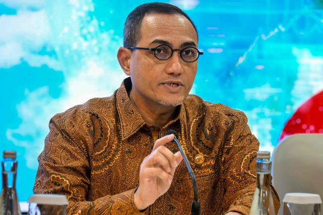 Indonesia Stock Exchange Director Jeffrey Hendrik speaks during a press conference at the Indonesia Stock Exchange in Jakarta on February 9, 2026. (Photo by BAY ISMOYO / AFP)