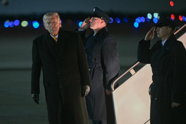 US President Donald Trump disembarks Air Force One after returning from his Mar-a-Lago residence, at Joint Base Andrews in Maryland on February 8, 2026. (Photo by Brendan SMIALOWSKI / AFP)