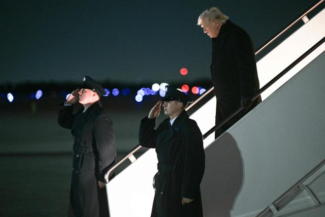 US President Donald Trump disembarks Air Force One after returning from his Mar-a-Lago residence, at Joint Base Andrews in Maryland on February 8, 2026. (Photo by Brendan SMIALOWSKI / AFP)